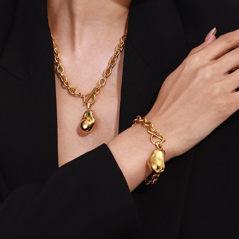 gold-stainless-steel-charm-bracelet