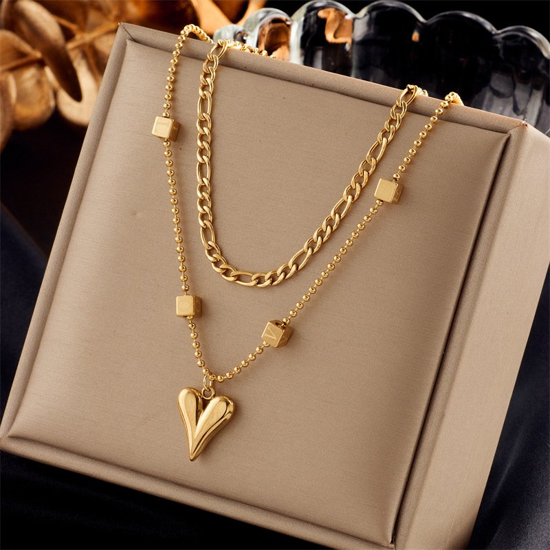 gold-heart-pendant-layered-necklace.jpg