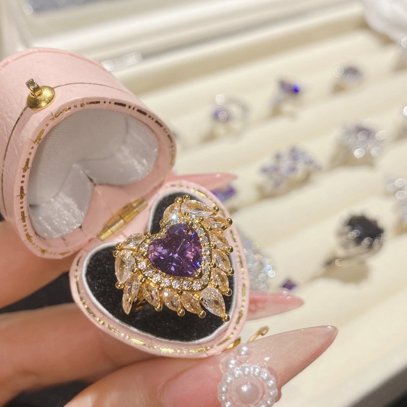 Close Up Of Layered Cubic Zirconia Angel Wing Open Statement Ring