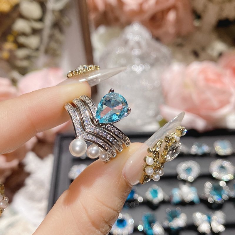 Blue Center Pave Crystal Flower Ring Silver Tone Hand Close Up