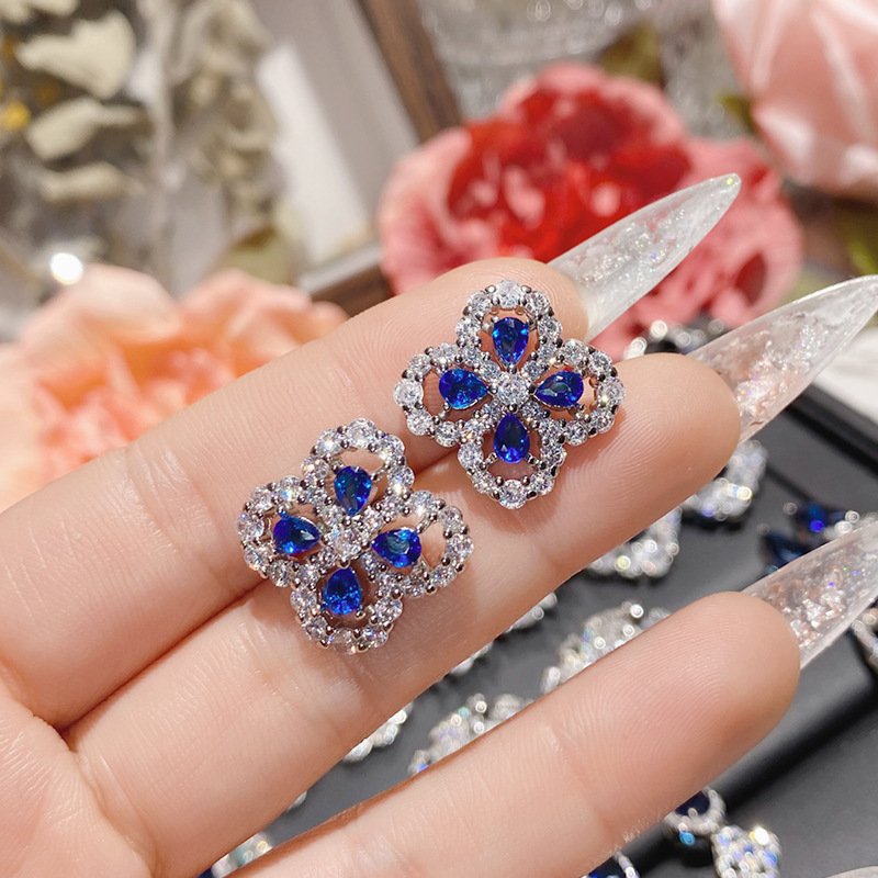 Blue Zircon Four Leaf Clover Stud Earrings, Silver Tone CZ Sapphire Statement Earrings For Women