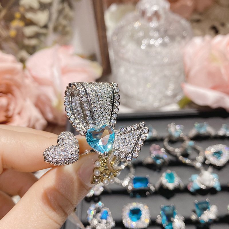 Blue Center Pave Crystal Flower Ring Silver Tone Hand Close Up
