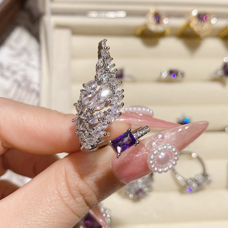 Close Up Of Layered Cubic Zirconia Angel Wing Open Statement Ring